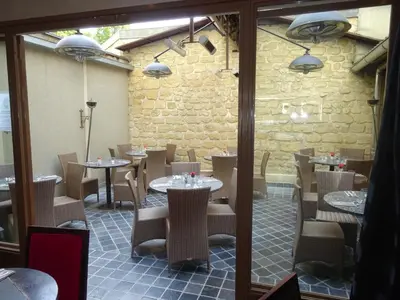 Coin salon dans l'établissement Au limousin