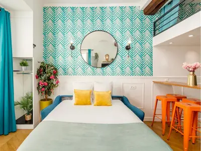 Un ou plusieurs lits dans un hébergement de l'établissement Merveil - Luxury Suite - Champs Elysées - Mermoz