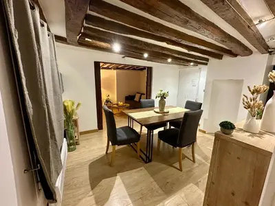 Coin salon dans l'établissement Superbe Appartement