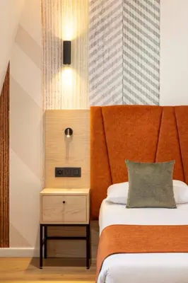 Un ou plusieurs lits dans un hébergement de l'établissement Hotel Espace Champerret