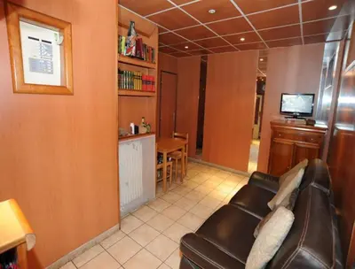 Cuisine ou kitchenette dans l'établissement Sully Hôtel