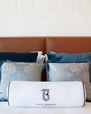 Un ou plusieurs lits dans un hébergement de l'établissement Hotel Bowmann