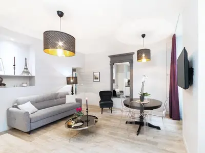 Coin salon dans l'établissement Chic Apartments Opera