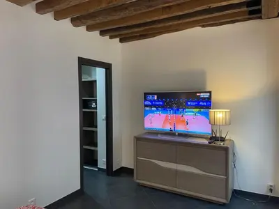 Télévision ou salle de divertissement dans l'établissement Thegreatflat