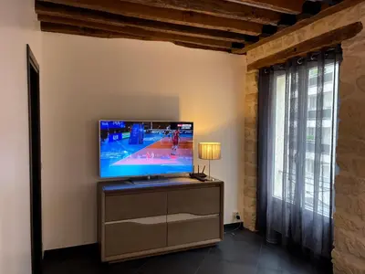 Télévision ou salle de divertissement dans l'établissement Thegreatflat