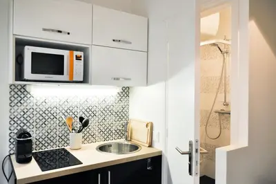 Cuisine ou kitchenette dans l'établissement Charming duplex in Montmartre