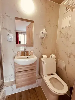 Salle de bains dans l'établissement Pavillon Opéra Lafayette