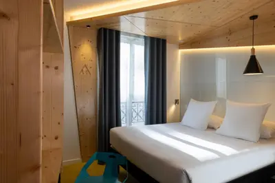 Un ou plusieurs lits dans un hébergement de l'établissement Urban Bivouac Hotel