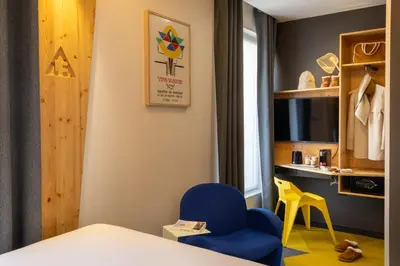 Un ou plusieurs lits dans un hébergement de l'établissement Urban Bivouac Hotel