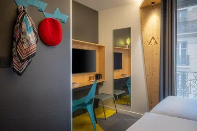 Télévision ou salle de divertissement dans l'établissement Urban Bivouac Hotel