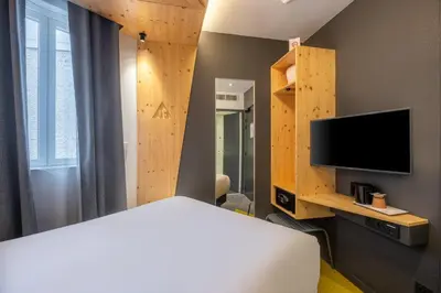 Un ou plusieurs lits dans un hébergement de l'établissement Urban Bivouac Hotel