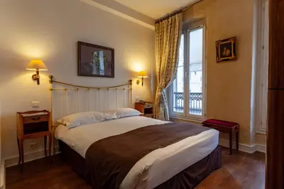 Un ou plusieurs lits dans un hébergement de l'établissement Hôtel Atlantis