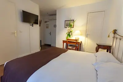 Un ou plusieurs lits dans un hébergement de l'établissement Hôtel Atlantis