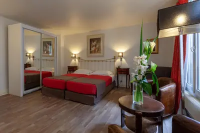 Un ou plusieurs lits dans un hébergement de l'établissement Hôtel Atlantis