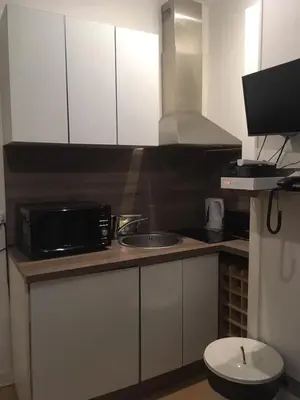 Cuisine ou kitchenette dans l'établissement Bridgestreet Le Marais - les halles - Republique