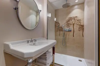 Salle de bains dans l'établissement Hotel Muguet
