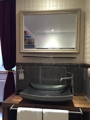 Salle de bains dans l'établissement Cosy Marais Paris