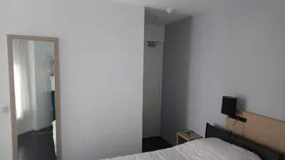 Un ou plusieurs lits dans un hébergement de l'établissement Hotel Rivoli