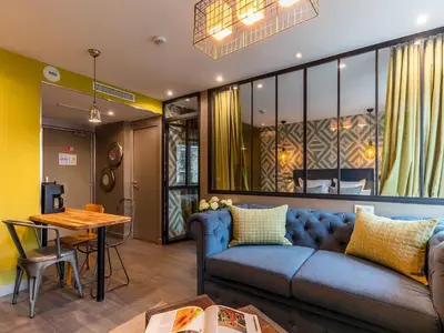 Coin salon dans l'établissement BE YOU LUXURY APART'HÔTEL Paris