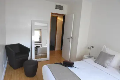 Un ou plusieurs lits dans un hébergement de l'établissement Short Stay Paris Apartments