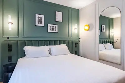 Un ou plusieurs lits dans un hébergement de l'établissement Hotel Elysée Secret