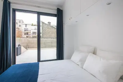 Un ou plusieurs lits dans un hébergement de l'établissement Le Scandinave, F3 avec terrasse, Villa Saint Charles