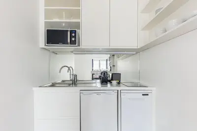 Cuisine ou kitchenette dans l'établissement Résidence Palais Étoile