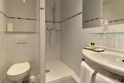 Salle de bains dans l'établissement Résidence du Pré