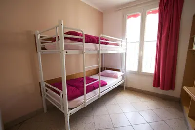 Un ou plusieurs lits dans un hébergement de l'établissement Bastille Hostel