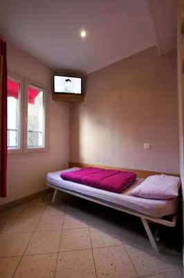 Un ou plusieurs lits dans un hébergement de l'établissement Bastille Hostel