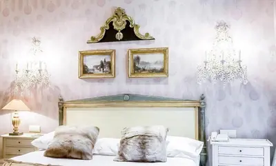 Un ou plusieurs lits dans un hébergement de l'établissement Hôtel du Romancier