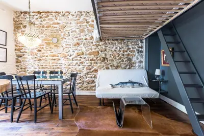 Coin salon dans l'établissement Cosy 40m² near MONTMARTRE