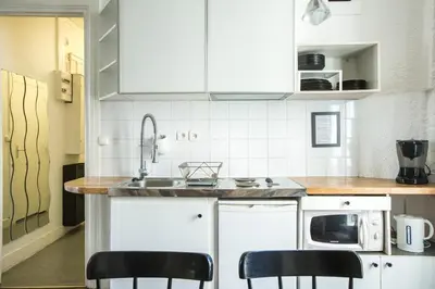 Cuisine ou kitchenette dans l'établissement Cosy 40m² near MONTMARTRE