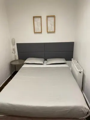 Un ou plusieurs lits dans un hébergement de l'établissement Hôtel de l'Europe