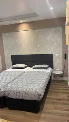 Un ou plusieurs lits dans un hébergement de l'établissement Hôtel de l'Europe