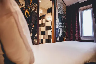 Un ou plusieurs lits dans un hébergement de l'établissement Hôtel du Continent