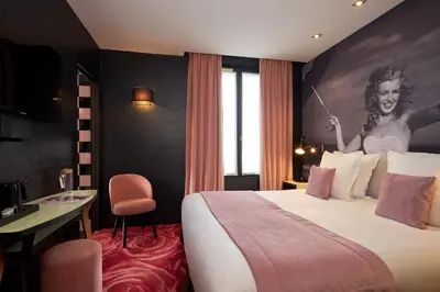 Un ou plusieurs lits dans un hébergement de l'établissement Platine Hotel