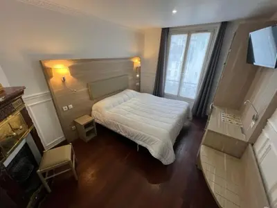 Un ou plusieurs lits dans un hébergement de l'établissement Hotel Celtic