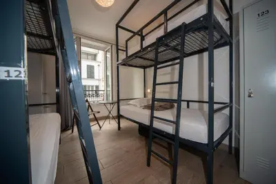 Un ou plusieurs lits dans un hébergement de l'établissement Enjoy Hostel