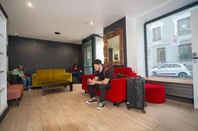 Coin salon dans l'établissement Enjoy Hostel