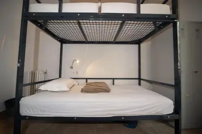 Un ou plusieurs lits dans un hébergement de l'établissement Enjoy Hostel