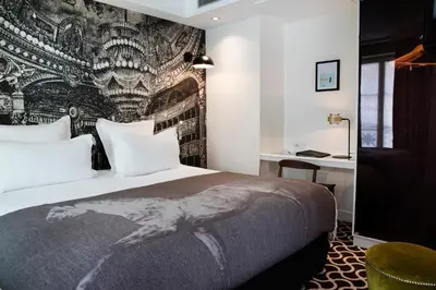 Un ou plusieurs lits dans un hébergement de l'établissement Hôtel Le Pradey