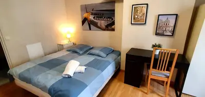 Un ou plusieurs lits dans un hébergement de l'établissement Welcome to Paris