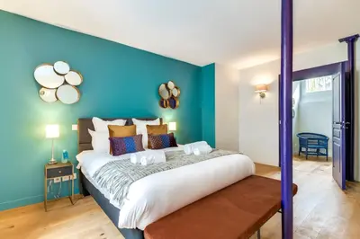 Un ou plusieurs lits dans un hébergement de l'établissement Sweett - Villa Montorgueil