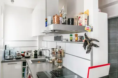 Cuisine ou kitchenette dans l'établissement Appartement Pontiac - Welkeys