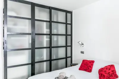Un ou plusieurs lits dans un hébergement de l'établissement Appartement Pontiac - Welkeys