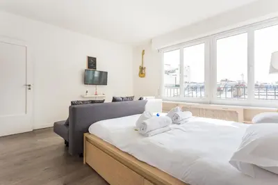 Un ou plusieurs lits dans un hébergement de l'établissement Cosy studio 4P Trocadero-Eiffel Tower