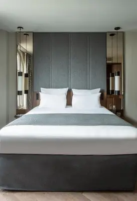Un ou plusieurs lits dans un hébergement de l'établissement Hotel Flanelles Paris