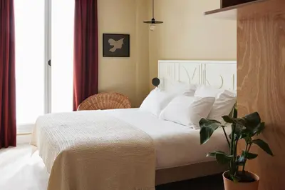 Un ou plusieurs lits dans un hébergement de l'établissement Hotel Orphée - Orso Hotels