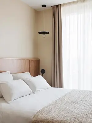 Un ou plusieurs lits dans un hébergement de l'établissement Hotel Orphée - Orso Hotels